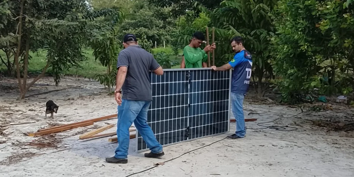 Solar panels installed in a wooded area